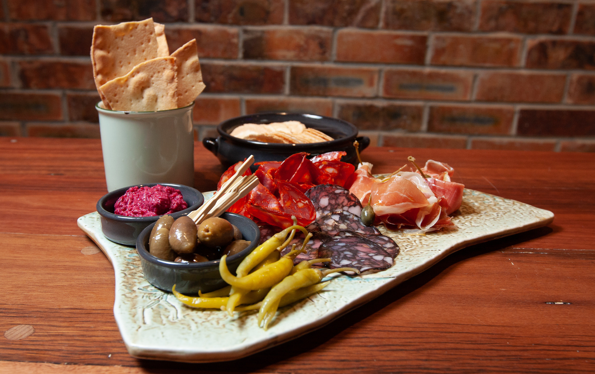 Charcuterie with meats dips and peppers el matador spanish tapas brisbane new opening